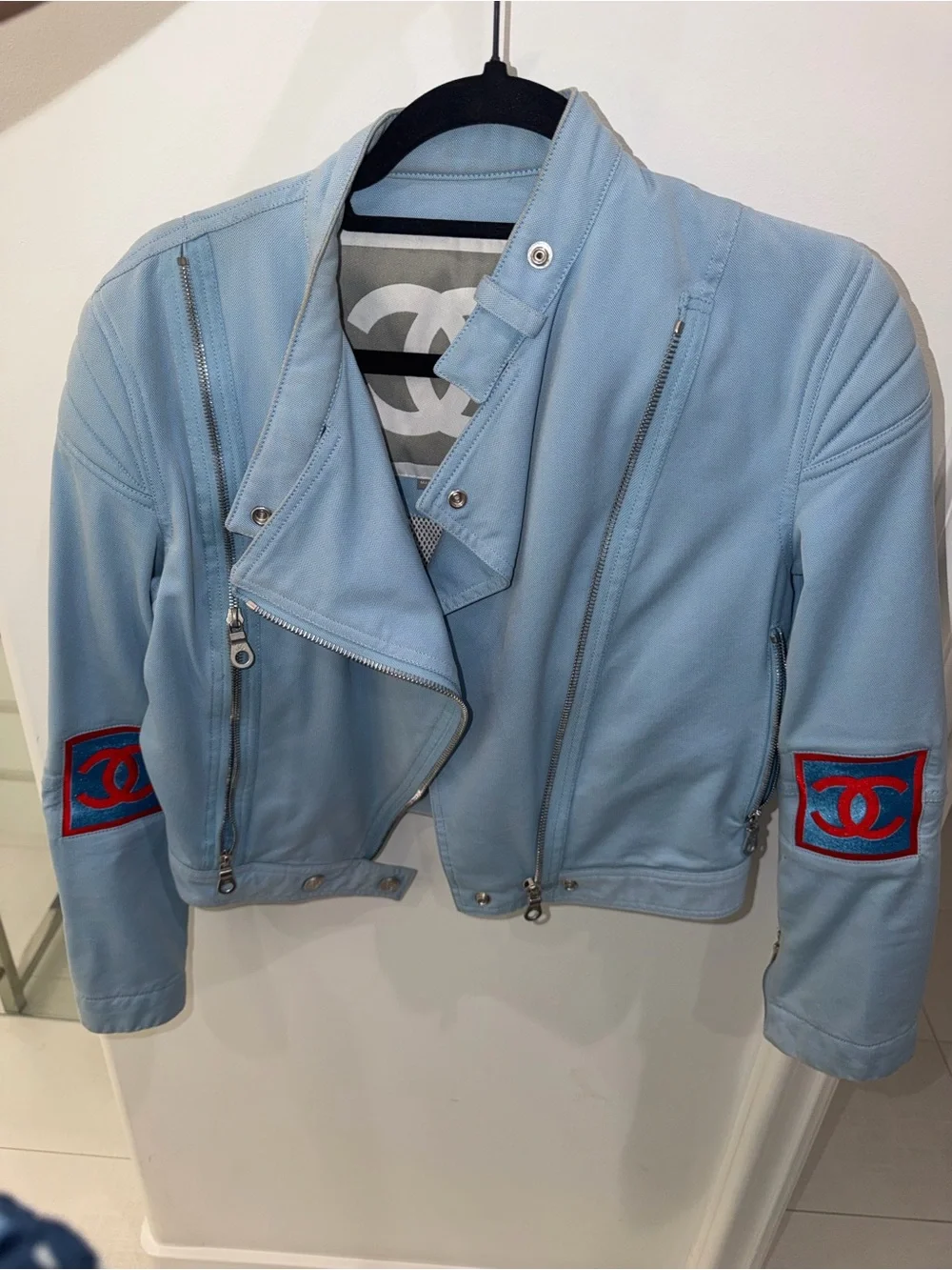 CHANEL Light Blue Leather Biker Jacket with Red Logo Patches